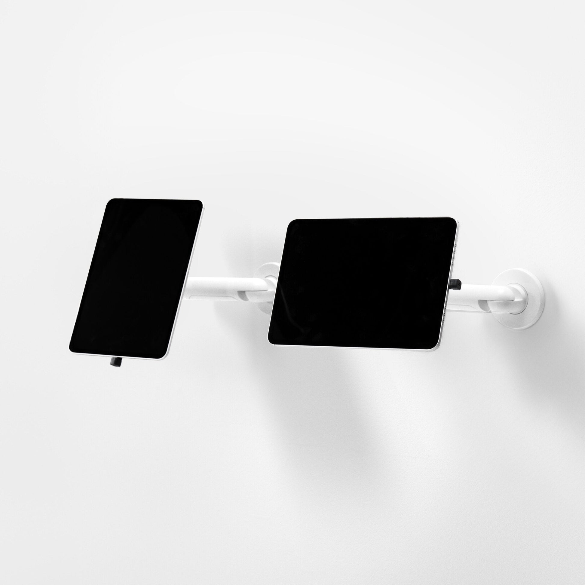 Bouncepad Core Reach tablet wandhouder in wit, staande en liggende oriëntatie